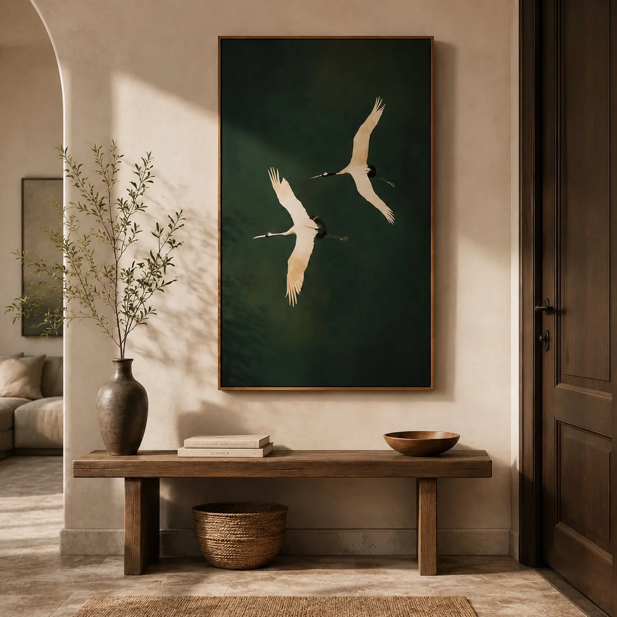 Framed crane artwork in a warm minimalist entryway