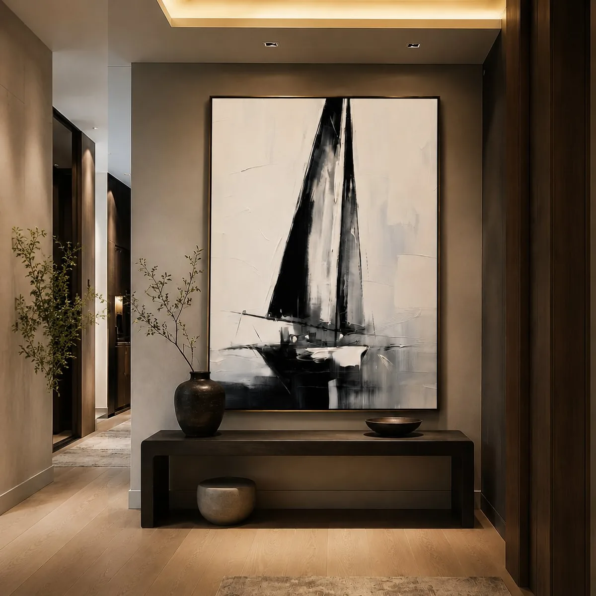 Black and white sailboat artwork in a modern hallway